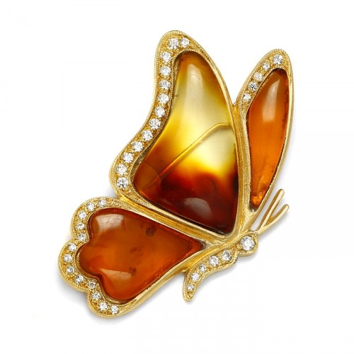Butterfly brooch with amber and zircons